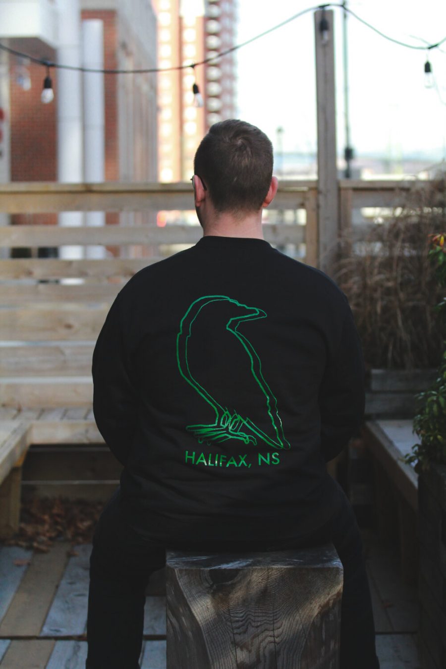 Black and green crew neck sweater rear